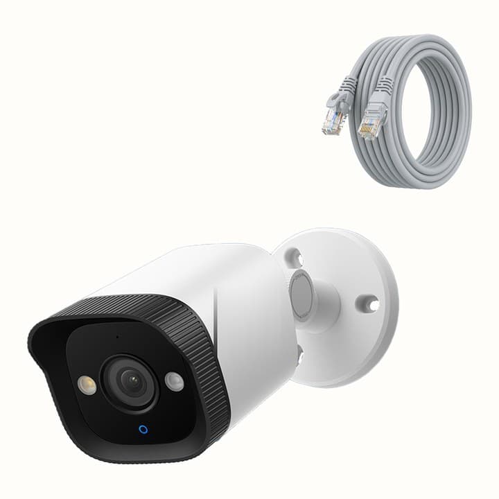 White cylindrical camera on a round wall bracket with a black lens face, beside a coiled grey network cable on a cream background