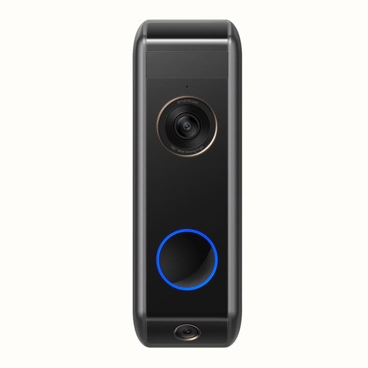 Tall black rectangular doorbell unit photographed head on, a round camera lens in a thin silver ring near the top and a blue lit circular button below it